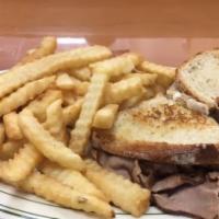 Chicago Roast Beef · Roast beef, swiss and horseradish sauce on grilled sourdough bread.
