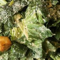 Appetizer Caesar Salad · Topped with grated Parmesan cheese and herb baked croutons. Salad dressing is served on the ...
