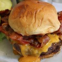 Bacon Cheeseburger Deluxe · Topped with Applewood smoked bacon and choice of cheese. 1/2 lb. of certified Angus beef. Se...