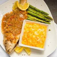 Tamarind Red Snapper · Whole Red Snapper lightly fried with a Tamarind Coriander sauce with Choice of two sides