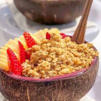 Açai Bowl · Açai berry blend topped with banana, strawberries, and granola.