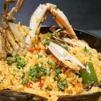Arroz Con Mariscos · Rice with seafood.