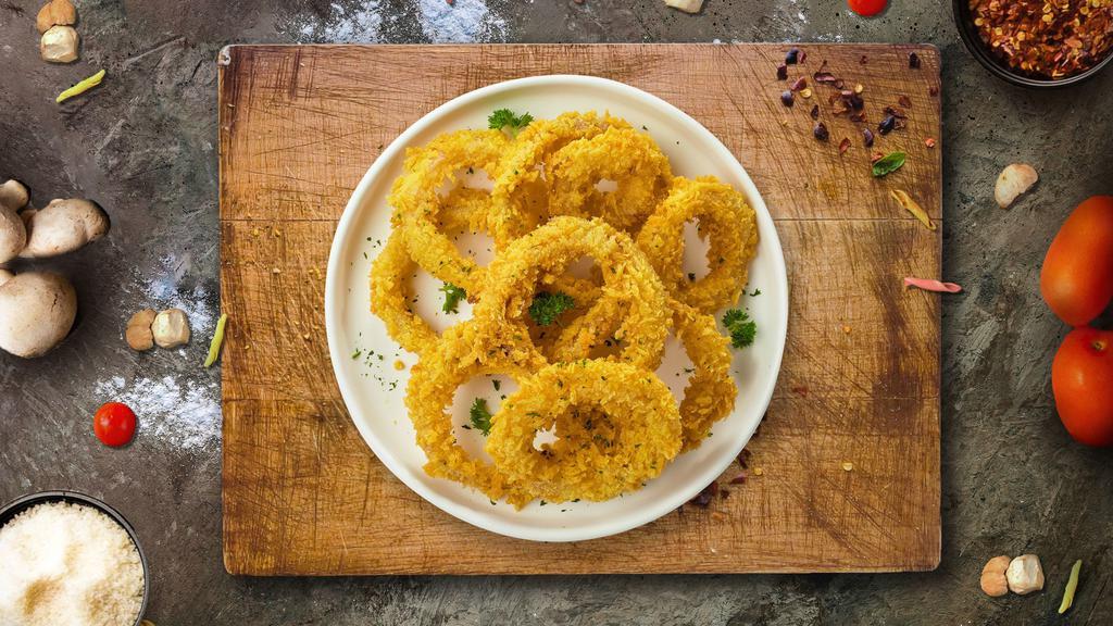 Onion Ring Blings · (Vegetarian) Sliced onions dipped in a light batter and fried until crispy and golden brown.