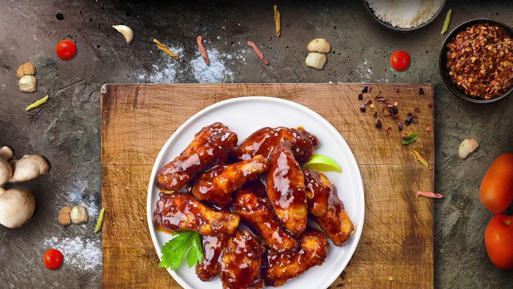 Bbq Sizzlers Wings · Fresh chicken wings breaded, fried until golden brown, and tossed in barbecue sauce. Served with a side of ranch or bleu cheese.
