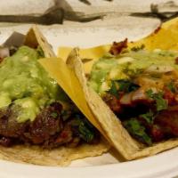 3 Carne Enchilada Tacos · Beef enchilada.