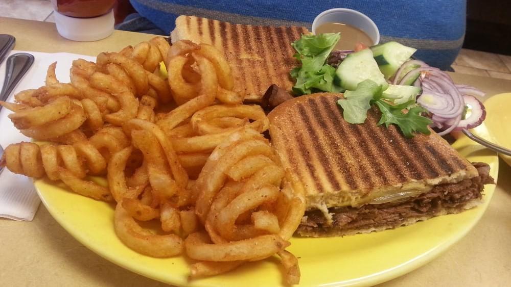 The Houston Panini · Roast Beef, Muenster cheese, sauteed onion, and honey Dijon mustard.