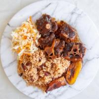 Oxtail · This very tasty tender brown stew oxtail is served over your choice of rice, you can choice ...