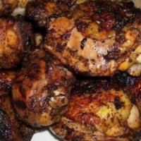 Jerk Chicken · This is real gril jamaican jerk chicken with the true flavor of the island, it is serve with...