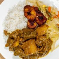 Curry Goat · Non spicy but flavorful, the real taste of the caribbean, curry goat is serve with your choi...