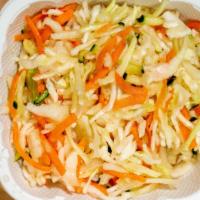 Coleslaw · No mayonaise, raw cabbage, carrots, and cucumber shredded together with a tangy sauce.