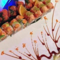 Moon River Roll · Salmon, avocado and peanut topped with spicy tuna and seaweed salad. Food allergies? If you ...