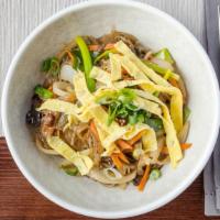 Vegetable Jab-Chae · Sweet potato noodles with vegetables, egg and mushrooms.