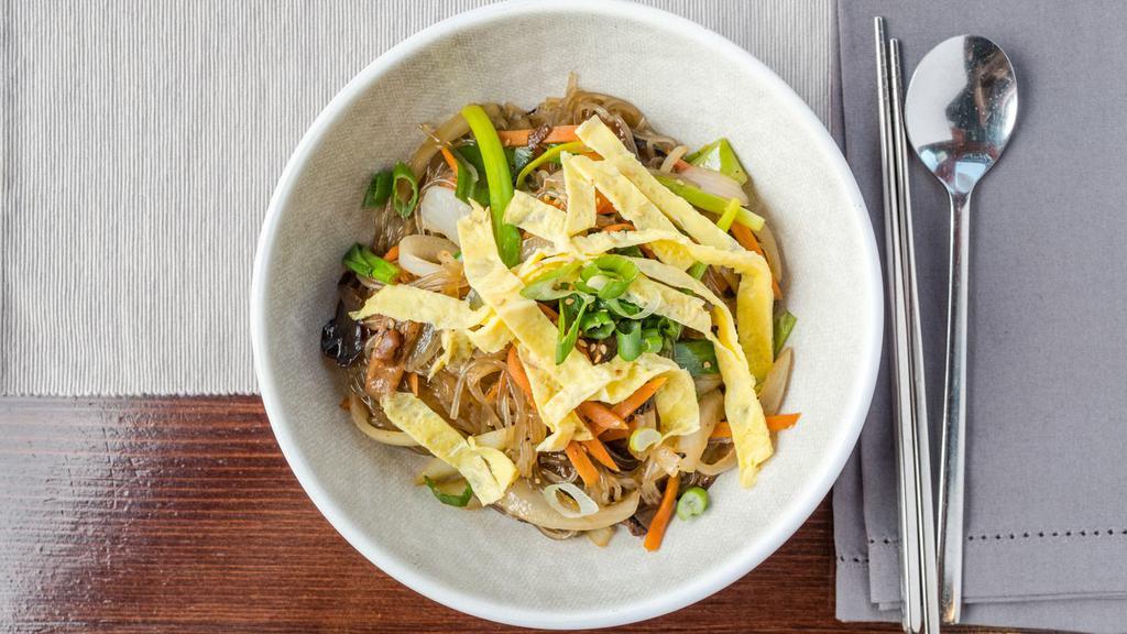 Vegetable Jab-Chae · Sweet potato noodles with vegetables, egg and mushrooms.