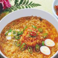 Korean Spicy Ramen · Noodles with vegetables and egg in spicy beef broth.