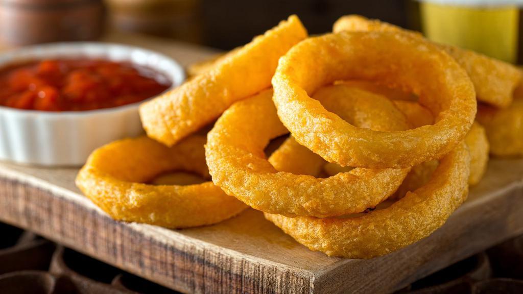Onion Rings · Fresh battered onions deep-fried to perfection.