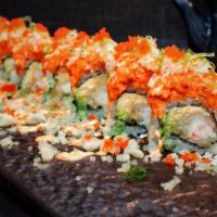 Lava Roll · Two pieces of shrimp tempura,cucumber and avocado, topped with spicy tuna, tempura crunch,sc...