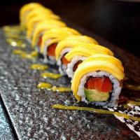Mango Hawaii Roll · Salmon, avocado and crunch. Topped with mango, served with mango sauce.
