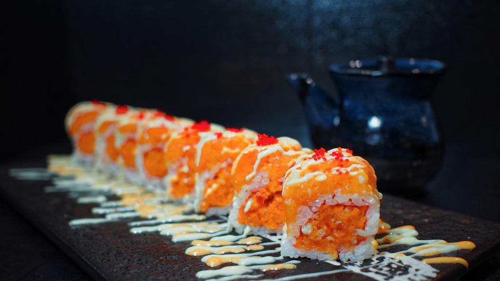 Robin Roll · spicy tuna wrapped in soybean paper, topped with spicy salmon and tobiko. served w. spicy mayo & honey wasabi mayo