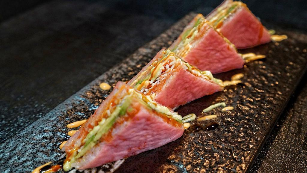 Sushi Sandwich · Spicy tuna, crab stick, avocado with 
soy paper, served w. spicy mayo & 
eel sauce.
