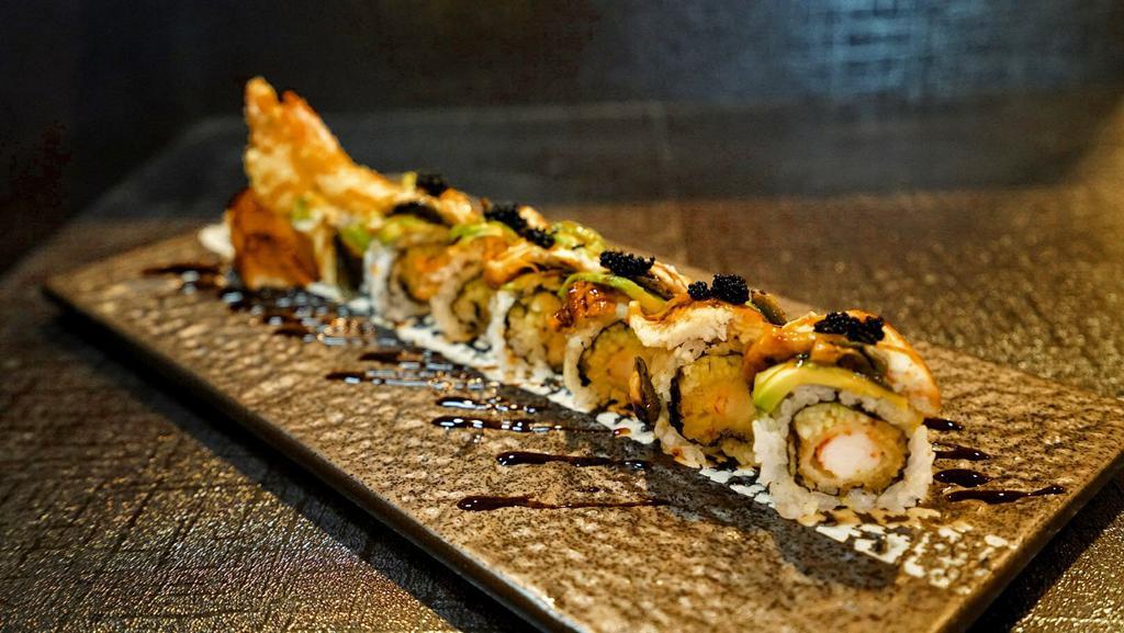 Black Dragon Roll · Shrimp tempura and cucumber. Topped with eel and avocado, served eel sauce.