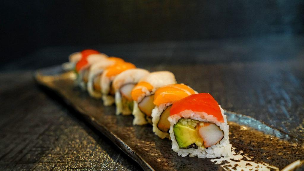 Rainbow Roll · Kani and cucumber, topped with tuna salmon & white fish.