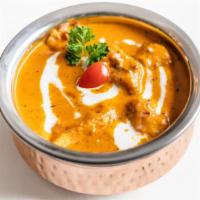 Chicken Tikka Masala · Tandoori boneless chicken in creamy tomato and fenugreek sauce.