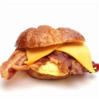 Bacon Egg Cheese Croissant · Fresh buttermilk croissants filled with eggs, bacon strips and choice of cheese.