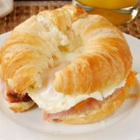 Egg On Croissant · Fresh buttermilk croissants filled with eggs.