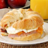 Ham Egg Cheese Croissant · Fresh buttermilk croissants filled with eggs, ham slices and choice of cheese.