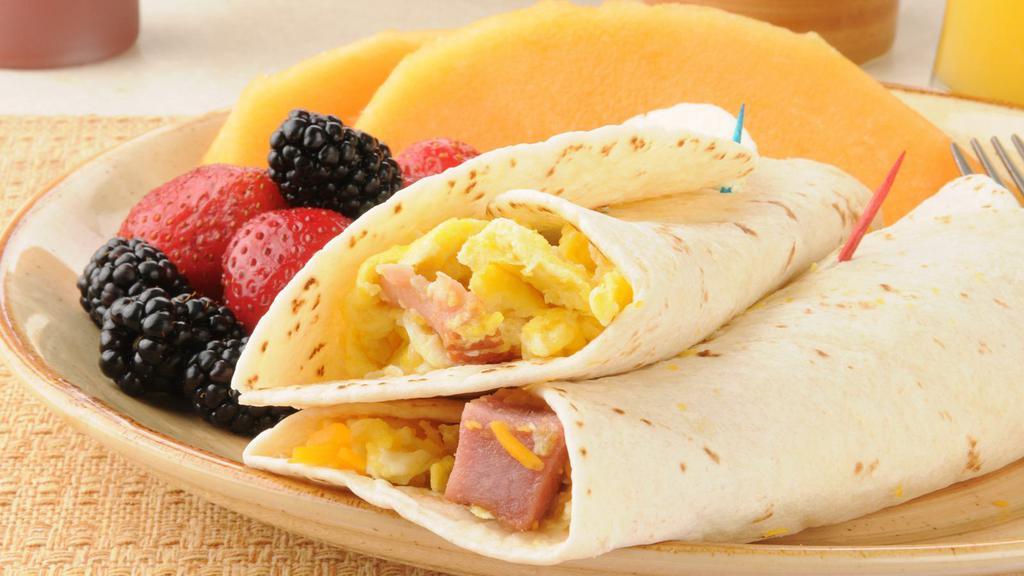 Bacon, Egg, Cheese Wrap · Customers choice of wrap with fresh cooked eggs, bacon pieces and warm melted cheese.