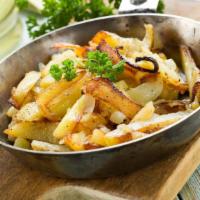 Home Fries · Delicious breakfast potatoes cooked with onions and peppers.