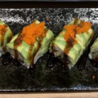 Dragon Roll · Eel, cucumber, avocado topped with avocado, tobiko. Cooked.