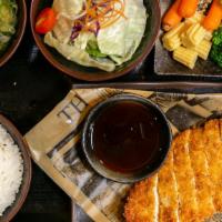 Chicken Katsu Dinner · Deep fried chicken breast cutlet topped with katsu sauce. Served with miso soup, salad, rice...