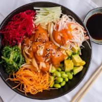 Salmon Poke Bowl · Salmon sashimi and onion mixed with chef's special sauce, shredded (carrot, beets, cucumber)...
