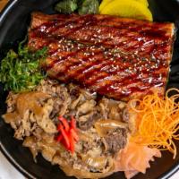 Una Gyu Don · Beef and eel, shredded carrot, seaweed salad, ginger, Japanese pickles, sesame seed over ric...