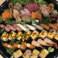Shoshaku Set 3 · Sashimi, sushi, and special rolls. Served with miso soup and salad.