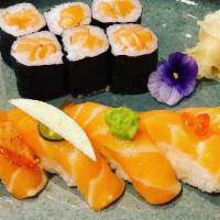 Salmon Lover · Five pieces salmon sushi and a salmon avocado roll. Miso soup and salad.