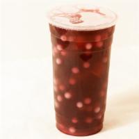 Signature Bubble Teas - Purple Magic · Pomegranate and blueberry with green tea pop pearls yogurt.