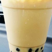 Signature Bubble Teas - Lychee-Peachy · Lychee and peach with black tea goji berries.