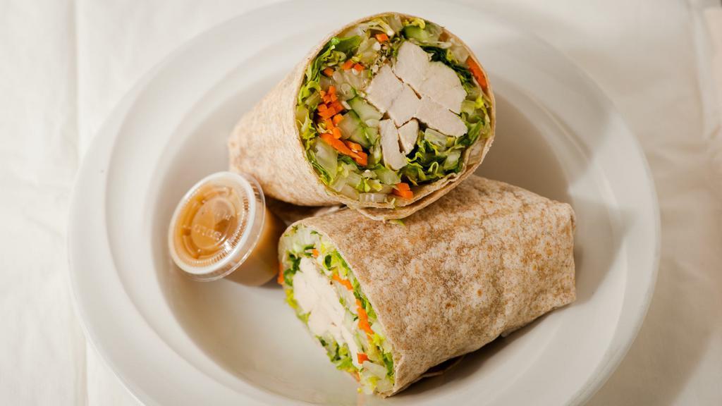 Grilled Sesame Chicken Wrap · Grilled all-natural chicken. cucumbers, carrots. toasted sesame seeds, alfalfa sprouts, and romaine hearts. Dressing: sesame ginger.