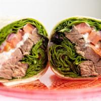 Bleu Steak Wrap · Angus steak, Gorgonzola cheese, red onions, spinach, and tomato. Dressing: jalapeño ranch.