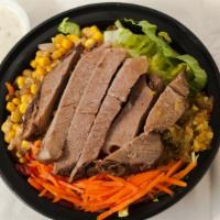 Southwest Pork Bowl · Healthy rice mix with braised pork, smoked jalapeno, romaine hearts, carrots, roasted corn, ...