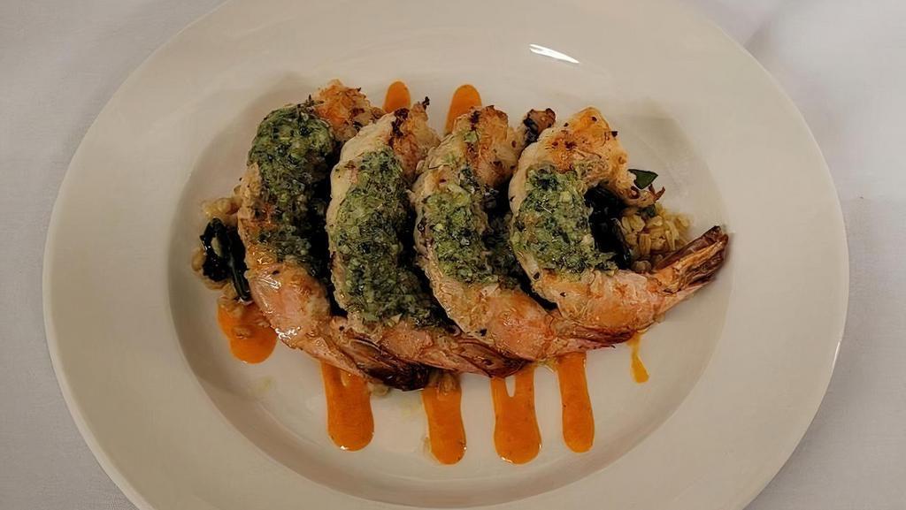 Scallops · grilled colossal shrimp - scampi butter - red pepper coulis - grano pilaf - sautéed spinach