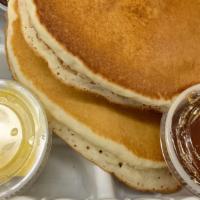 Hot Cakes 3 Stack · 3 Hot Cakes,   Butter, & Pancake Syrup, Topped W/ Powdered Sugar.