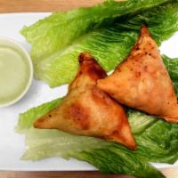 Samosa · Deep fried pastry filled with vegetable or meat.