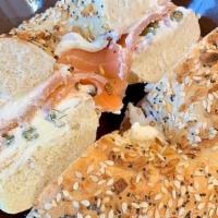 Salmon Bagel Sandwich · Cream Cheese, Cucumbers, Onions, Salmon, Red Pepper Flakes