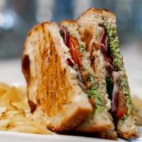 Bombay Sandwich · Sourdough Bread, Butter, Mint & Date Chutney, Onion, Tomato, Cucumber, Cheddar Cheese. Serve...