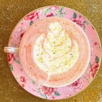 Rose Chai · Rooh-afza, chai, milk and rose petals.