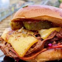 Smoked Brisket Burger + Fries · Overnight smoked brisket (lean flat) piled with Applewood smoked bacon, crispy fried onions,...