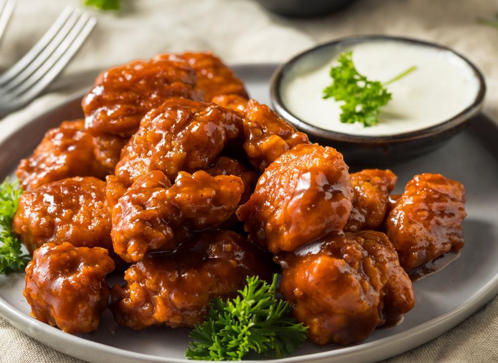 Boneless Wings (Medium) · Half pound boneless wings with your choice of sauce.